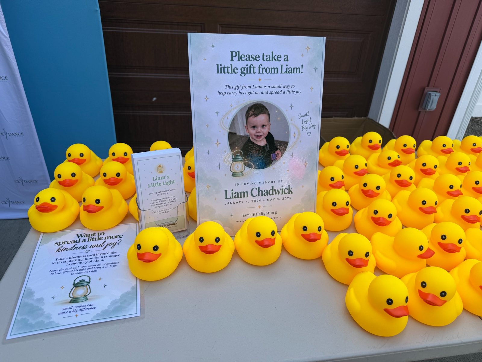 Rubber duckies and Liam's Little Light materials at Family Fun Day 2026 at the town park